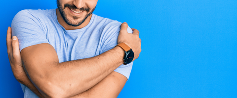 Man hugging himself