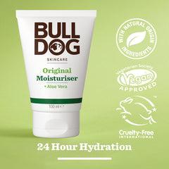 A tube of Original Moisturiser for men sits on a green background with labels highlighting natural origin ingredients, vegan approval, cruelty-free status, 24-hour hydration, and carbon neutral certification.