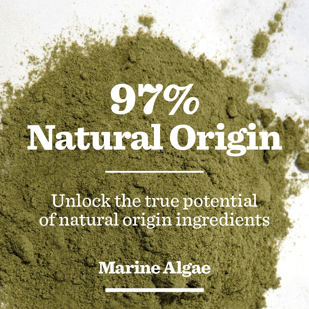 Greenish-brown powder on a white surface with text: “97% Natural Origin. Unlock age-defence with natural ingredients in the Age Defence Skincare Routine Bundle, featuring Marine Algae to elevate your skincare.”.
