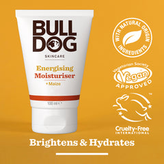 A 100ml tube of Energising Moisturiser on a yellow background. Icons highlight natural origin ingredients, vegan approval, and cruelty-free status. Text reads: Brightens & Hydrates with brightening properties.