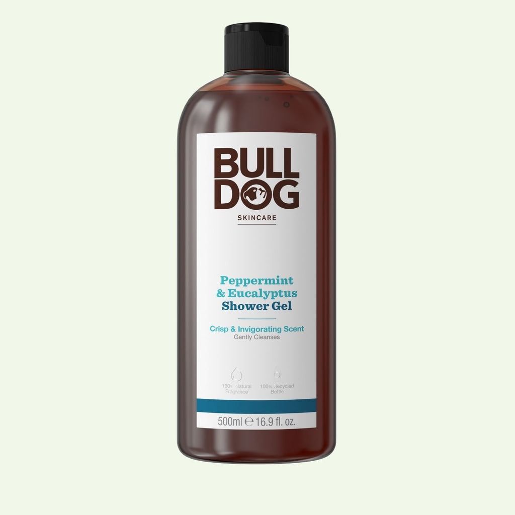 A 500 ml bottle of Peppermint & Eucalyptus Shower Gel features a black cap, white label, blue text, and a natural fragrance for an invigorating mens cleanse.