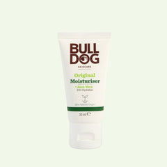A white tube of Bulldog Skincare Travel Original Moisturiser for men, featuring 96% natural origin ingredients like aloe vera, offers 24-hour hydration in a 30ml size and stands upright on a pale background.